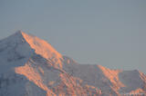 The peak of Mt. St. Elias in early morning alpenglow.