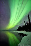 Reflection of Aurora borealis photo