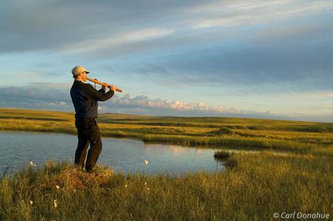 Person playing music in Arctic National Wildlife Refuge