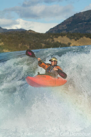 Whitewater kayaker on the Baker River, Patagonia, Chile. (model release available)