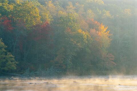 Mist rises on the Little Tennessee River, North Carolina. The Nantahala National Forest region, western North Carolina mountains, fall.