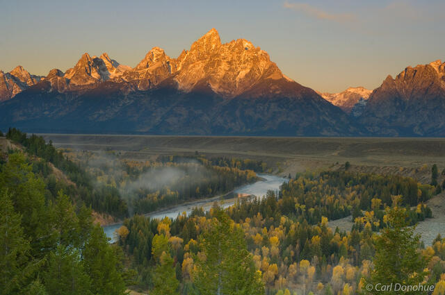 The awesome Grand Tetons at dawn, as seen from the Snake River Overlook, and Grand Teton National Park, Wyoming.