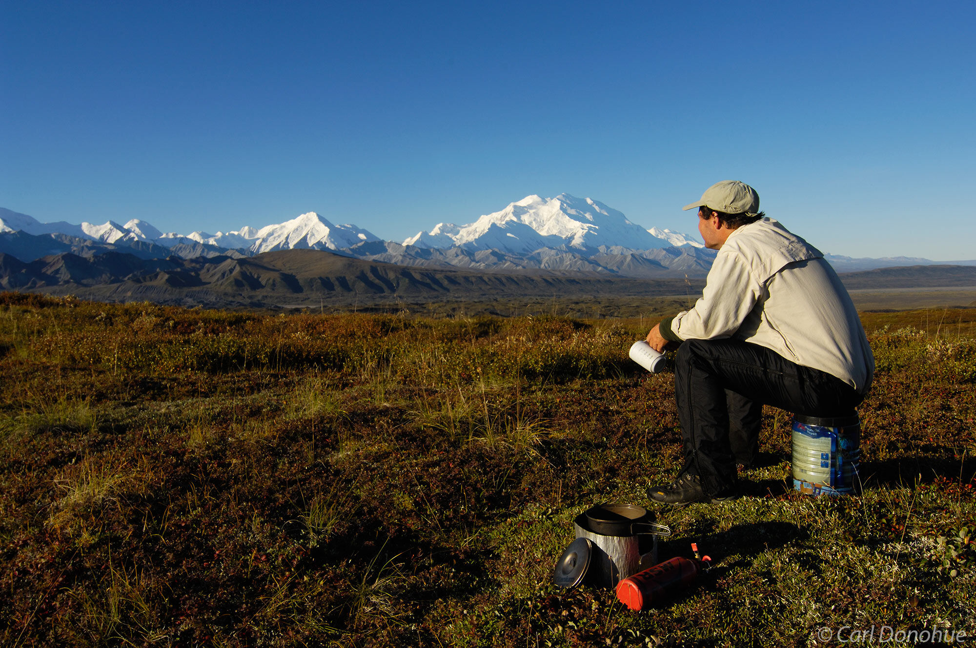 Backpacking in Denali National Park, affords great views like this one of Mt. McKinley, or "Denali", for breakfast, Denali National...