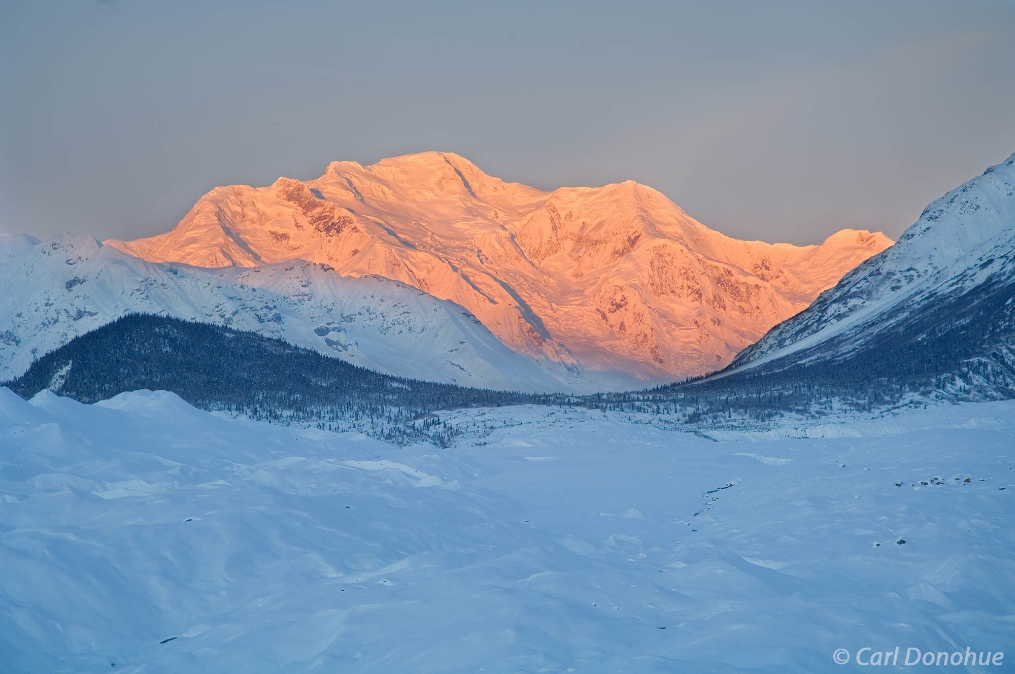 Mt Blackburn, across the Root Glacier, Donoho Basin, winter, dawn, alpenglow, Wrangell-St. Elias National Park, Alaska.