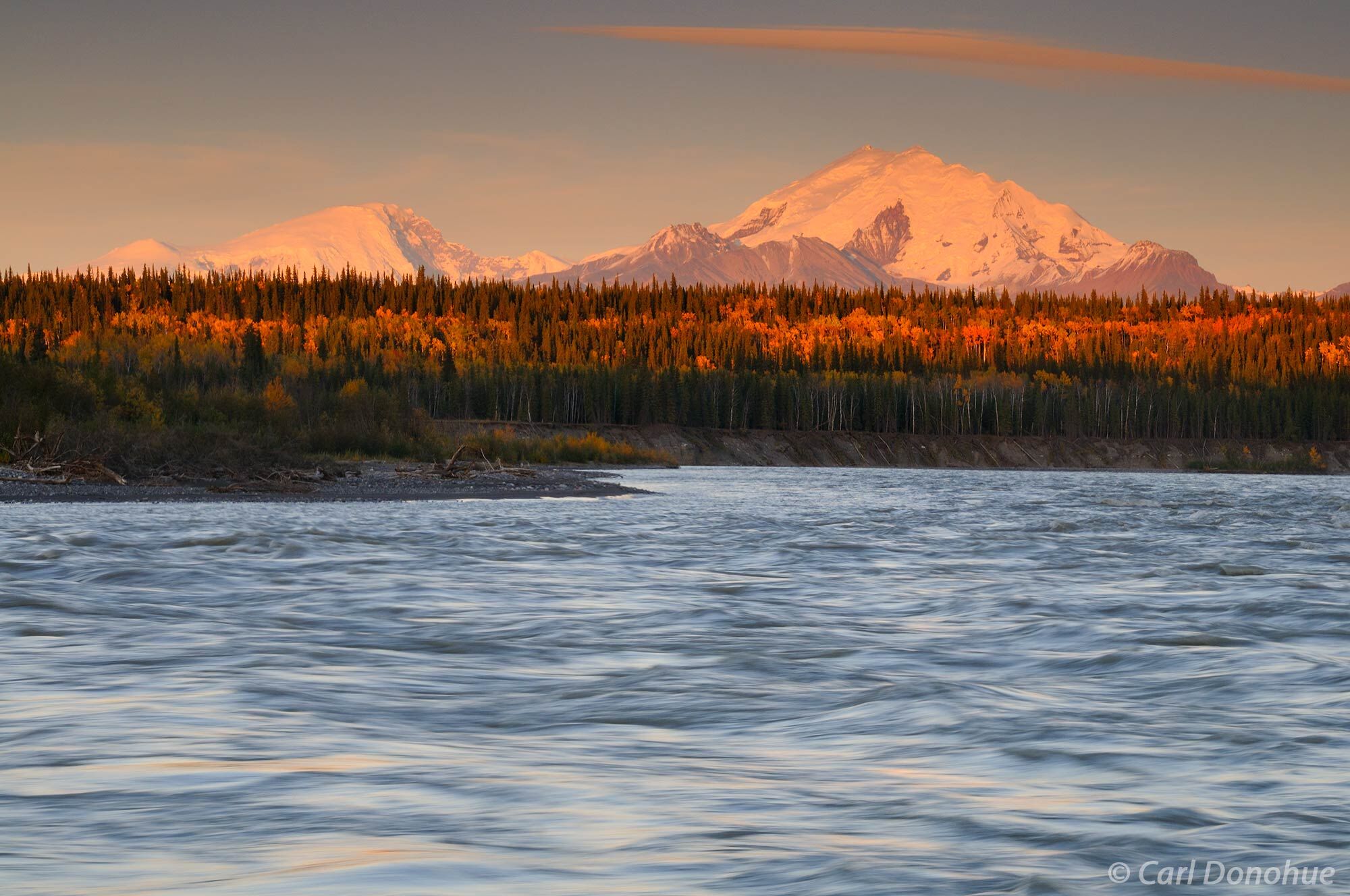 The Copper River flows by Mt Sanford and Mt Drum, the western boundary of Wrangell-St. Elias National Park and Preserve.  Fall...