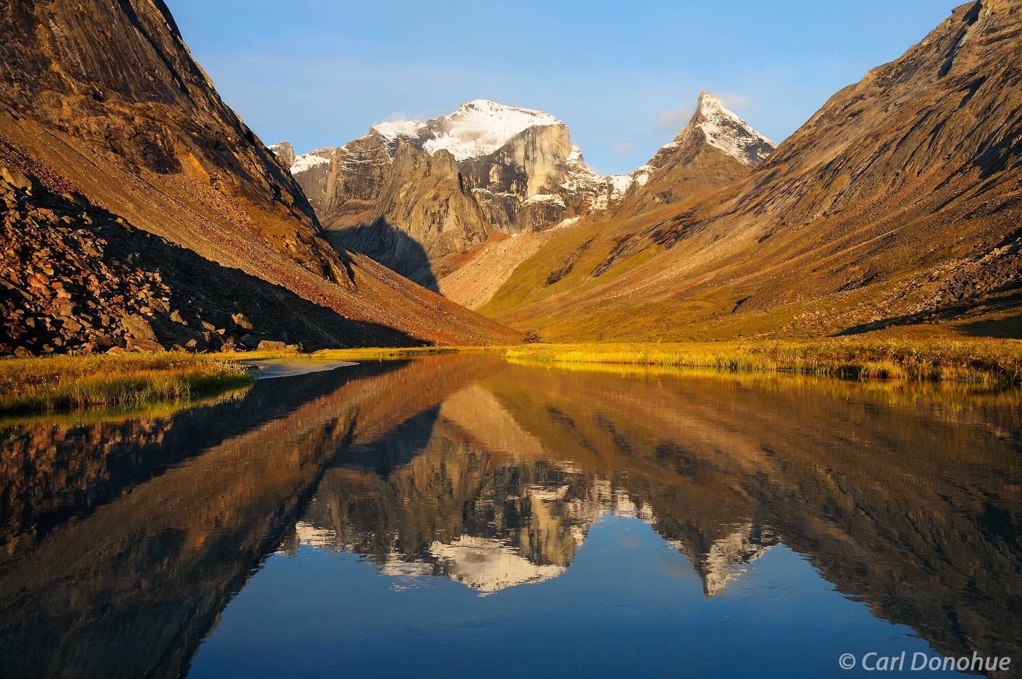 Arrigetch Creek and reflection of the Arrigetch Peaks, Albatross, Xanadu, and Ariel. Early morning light, just after sunrise...