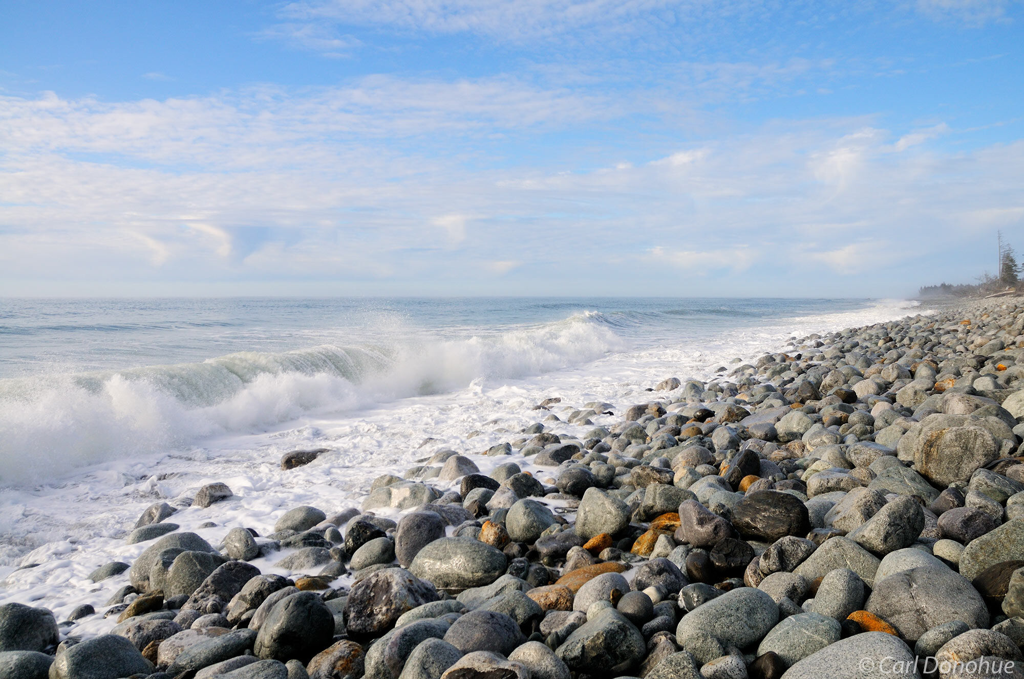 Rocks and boulders strewn along the beach of Sitkagi Bluffs, near the Malaspina Glacier. The rocks are remnants of the glacial...