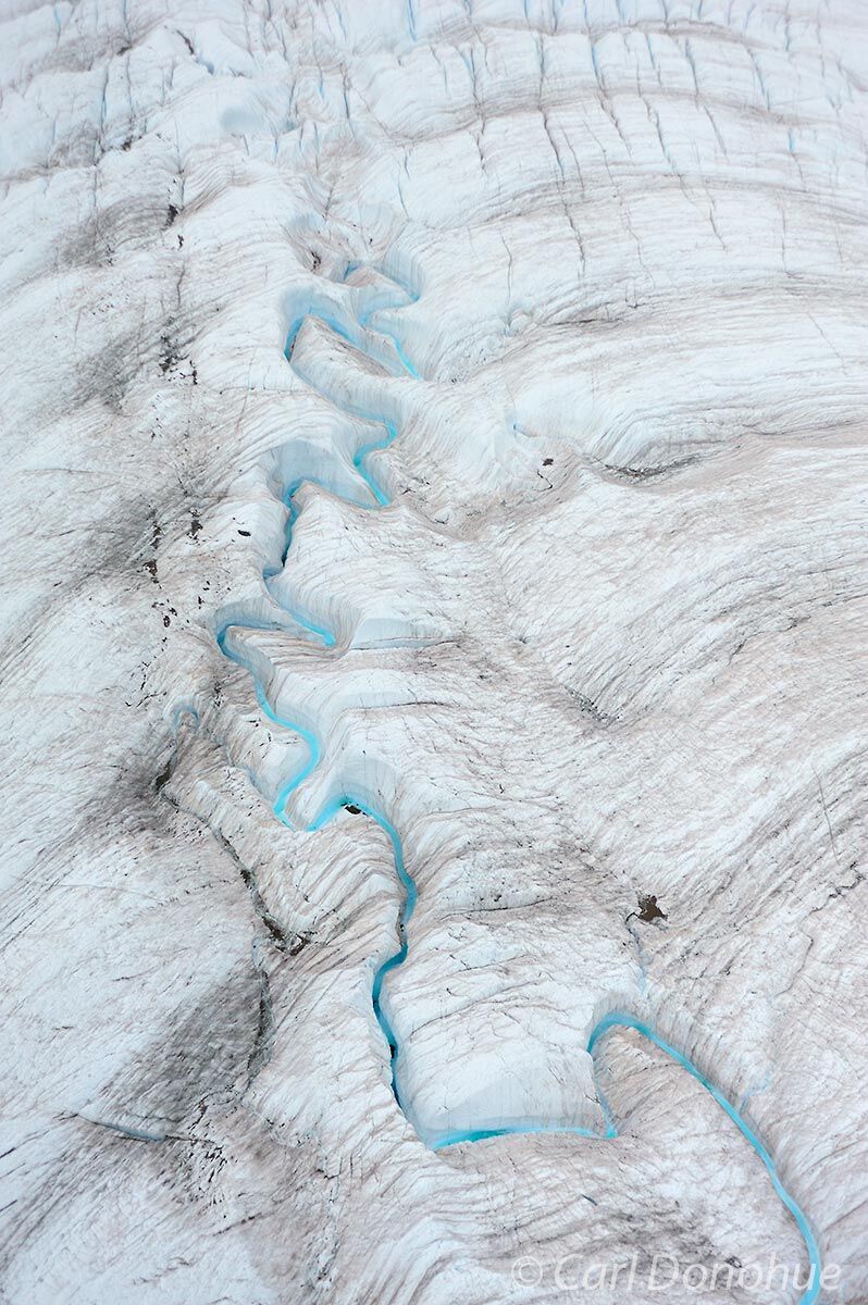 Glacial stream on the Root Glacier, near Kennicott, Wrangell-St. Elias National Park and Preserve, Alaska. (aerial photo)