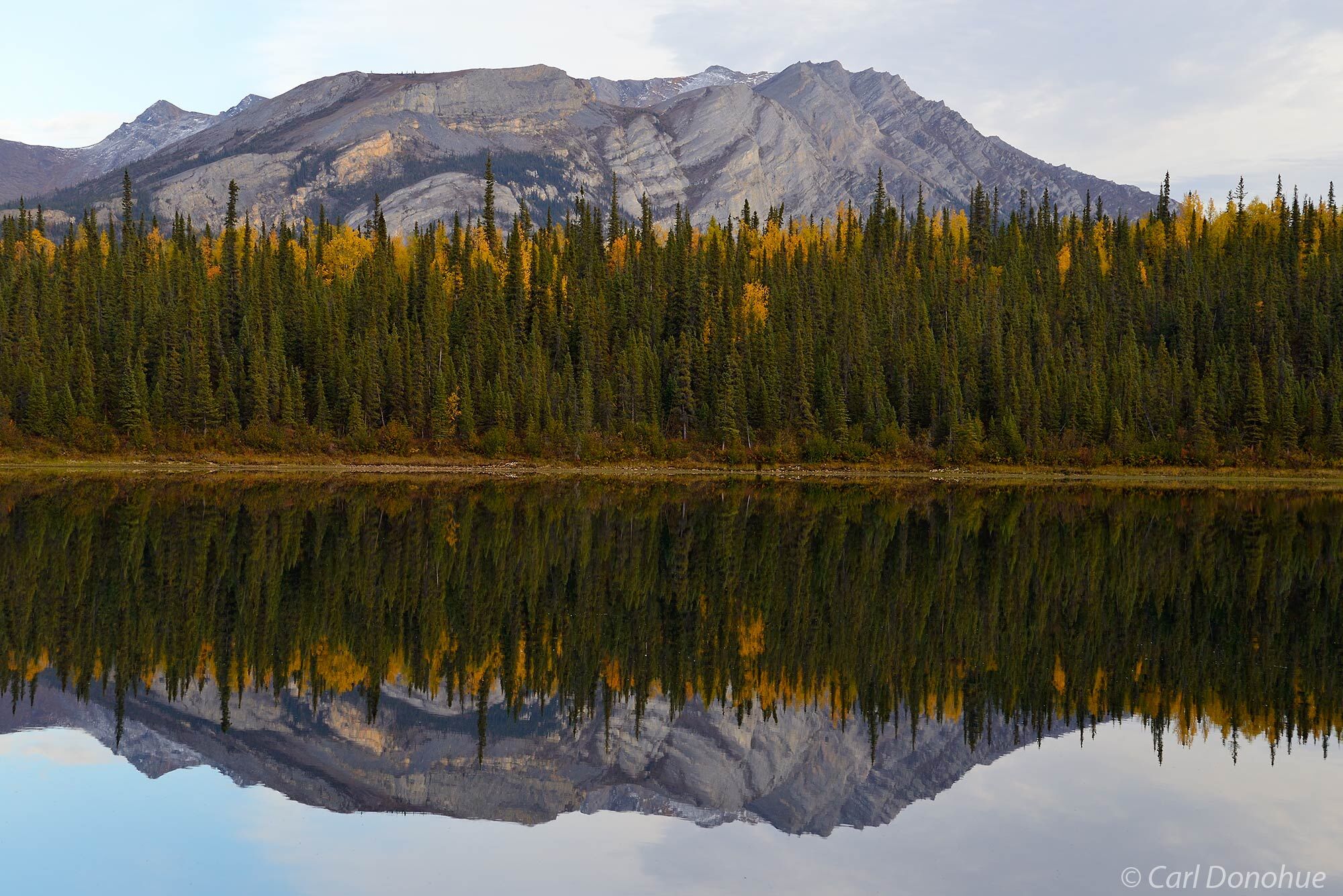 The Brooks Range and Takahula Lake, reflections, fall colors, Gates of the Arctic National Park and Preserve, Alaska.
