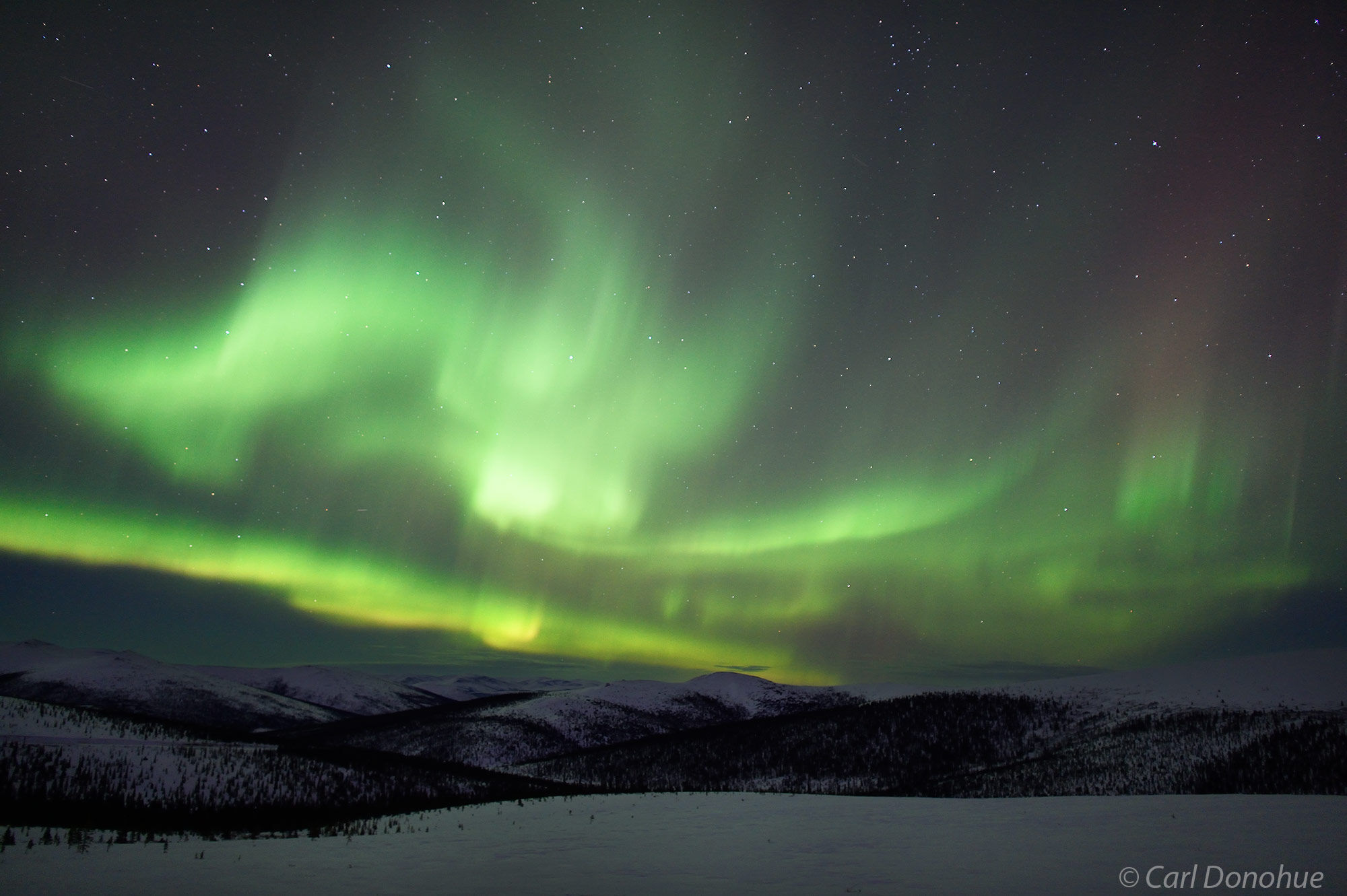 The White Mountains of central interior Alaska and a magnificent Aurora borealis photo, or northern lights, Alaska.