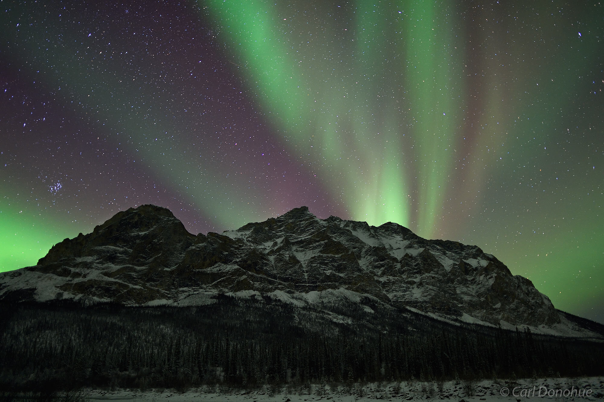 A massive aurora display over the Brooks Mountain Range. Aurora borealis photo, or northern lights, Gates of the Arctic National...