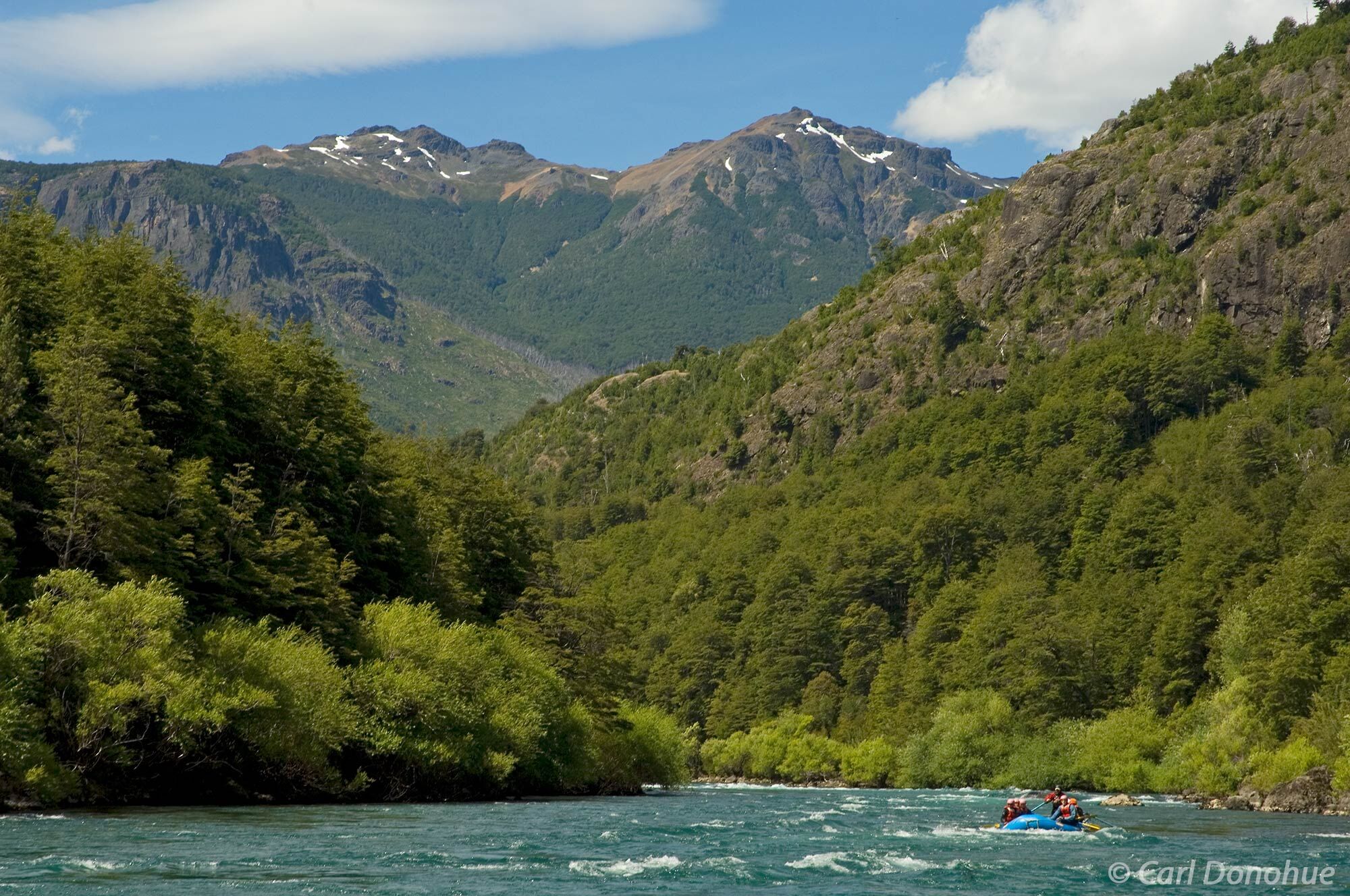 The Andes mountains tower above the Futaleufu River in Region X, Patagonia, southern Chile. The famous Puente a Puente rafting...