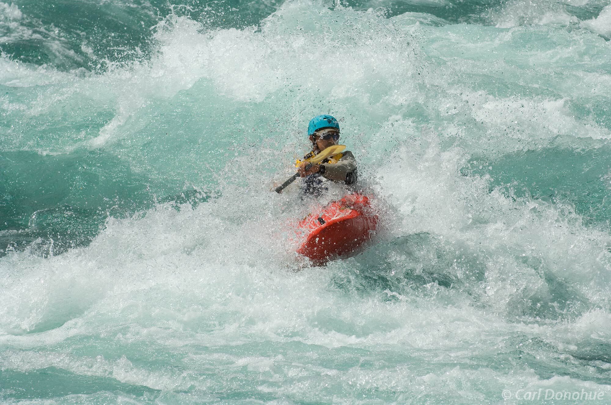 A whitewater kayaker, Josh Lowry, paddles the Class IV rapid Mondaca, on the Futaleufu River, Region X, Patagonia, Chile.