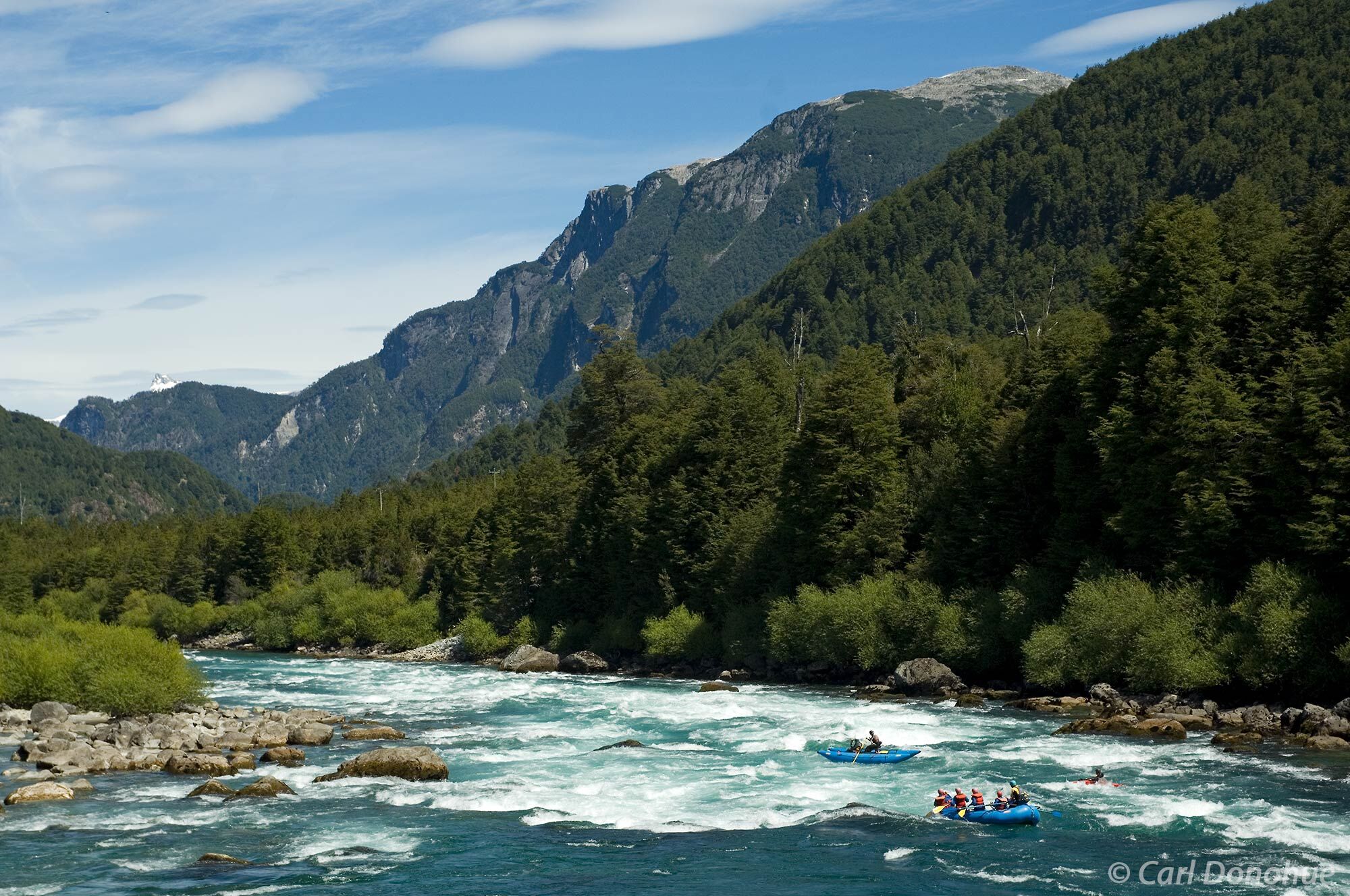 Whitewater rafters begin their trip by entering Zapata, a Class IV rapid, at the beginning of the Bridge to Bridge section of...