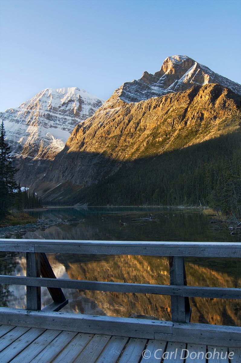 Mt Edith Cavell and reflection from the footbridge, Lake Edith Cavell, summertime, Jasper National Park, Alberta, Canada.