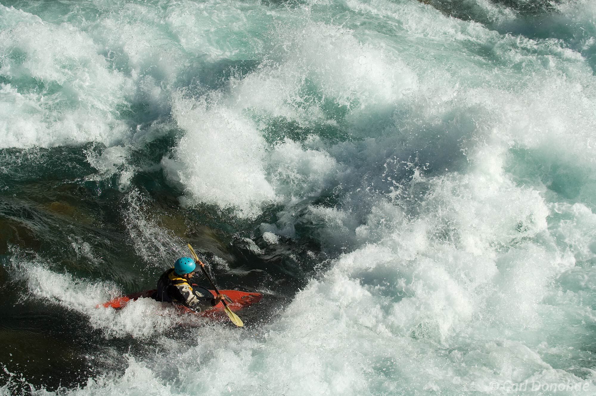 Josh Lowry, reknown whitewater kayaker enters Dynamite, a new Class IV rapid in Hell's Canyon or Infierno Canyon, on the Futaleufu...