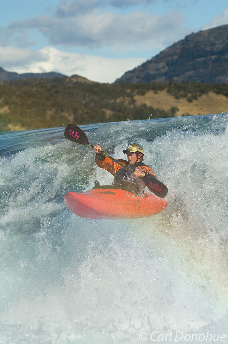 Whitewater kayaker on the Baker River, Patagonia, Chile. (model release available)