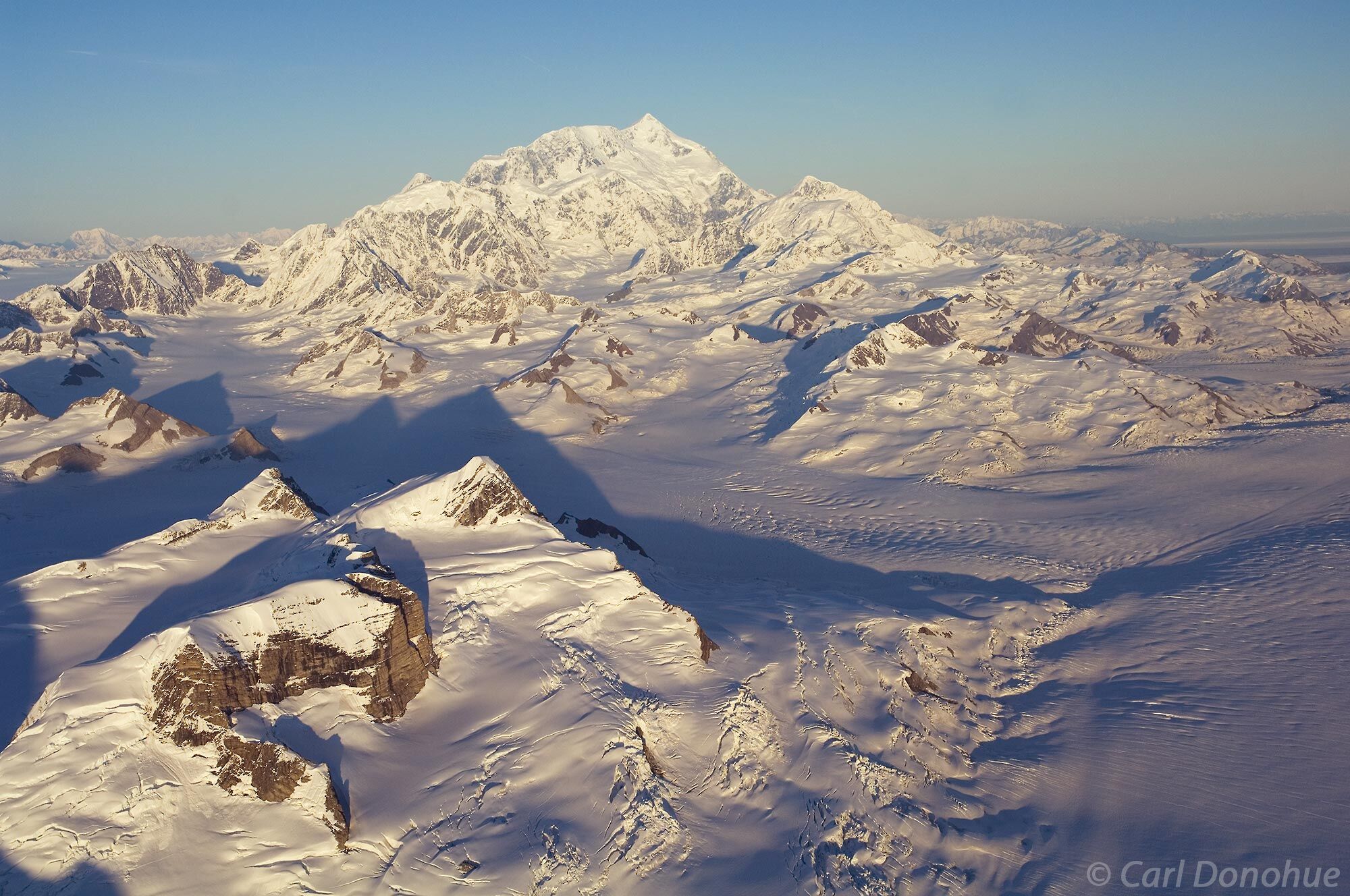 An aerial photo of Mt. St. Elias and the Saint Elias Mountain Range, Wrangell-St. Elias  National Park and Preserve, Alaska....